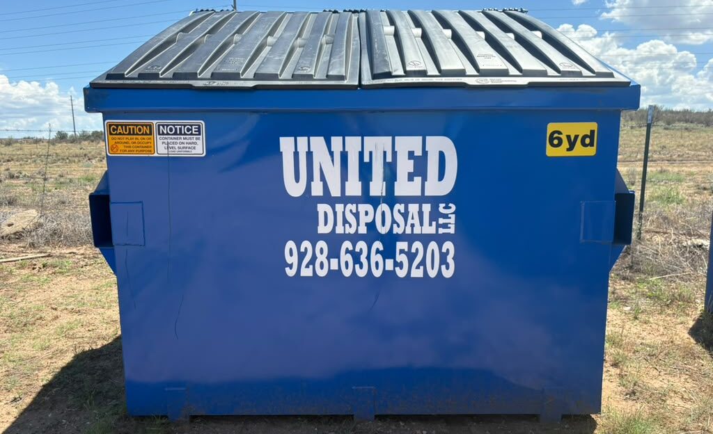United Disposal LLC blue dumpster container for commercial waste disposal in Arizona